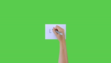 Woman-Writing-Loss-and-Downward-Arrow-on-Paper-with-Green-Screen