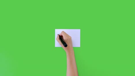 Woman-Writing-Pass-with-a-Tick-on-Paper-with-Green-Screen