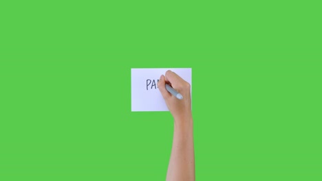 Woman-Writing-Panic-Buying-on-Paper-with-Green-Screen