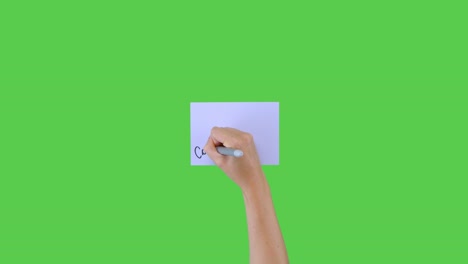 Woman-Writing-Congratulations-on-Paper-with-Green-Screen