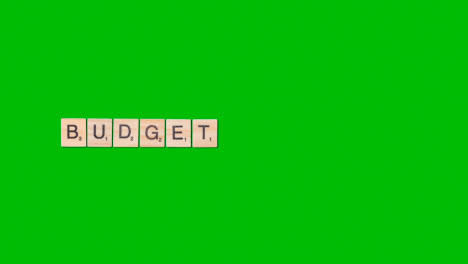 Stop-Motion-Business-Concept-Overhead-Wooden-Letter-Tiles-Forming-Word-Budget-On-Green-Screen-1
