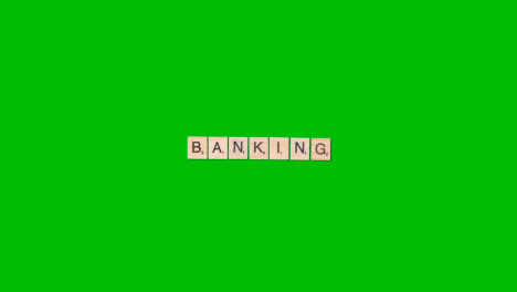 Stop-Motion-Business-Concept-Overhead-Wooden-Letter-Tiles-Forming-Word-Banking-On-Green-Screen