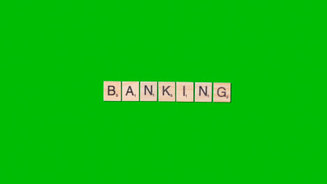 Stop-Motion-Business-Concept-Overhead-Wooden-Letter-Tiles-Forming-Word-Banking-On-Green-Screen-1
