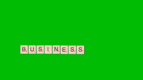 Stop-Motion-Geschäftskonzept-Overhead-Holzbuchstabenfliesen,-Die-Wortgeschäft-Auf-Grünem-Bildschirm-Bilden-1