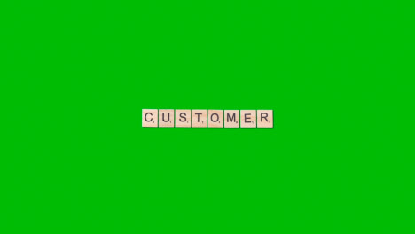 Stop-Motion-Business-Concept-Overhead-Wooden-Letter-Tiles-Forming-Word-Customer-On-Green-Screen