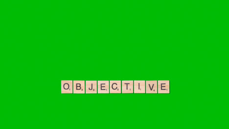 Stop-Motion-Business-Concept-Overhead-Wooden-Letter-Tiles-Forming-Word-Objective-On-Green-Screen-1