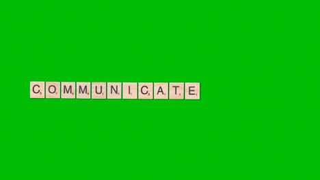 Stop-Motion-Geschäftskonzept-Overhead-Holzbuchstabenfliesen,-Die-Wort-Bilden,-Kommunizieren-Auf-Grünem-Bildschirm-1