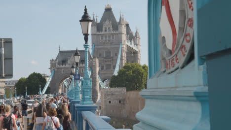 Summer-Tourists-Walking-By-Tower-Bridge-London-England-UK-With-Traffic-1