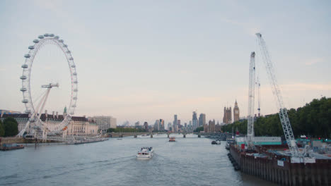 River-Thames-Skyline-With-Big-Ben-London-Eye-Westminster-Bridge-And-Houses-Of-Parliament-England-UK