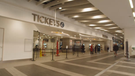 Passengers-Outside-Ticket-Office-Of-Birmingham-New-Street-Railway-Station