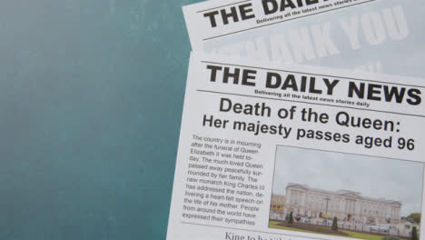 Tracking-Shot-of-Queen-Elizabeth-Death-Newspaper-Headlines-with-Copy-Space-02