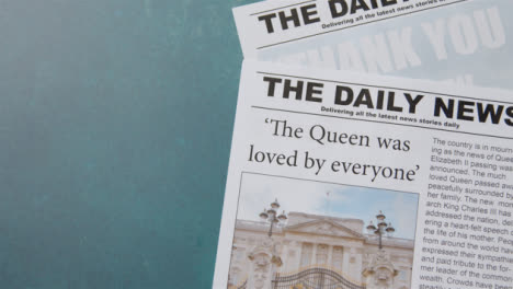 Tracking-Shot-of-Queen-Elizabeth-Death-Newspaper-Headlines-with-Copy-Space-05