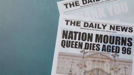 Tracking-Shot-of-Queen-Elizabeth-Death-Newspaper-Headlines-with-Copy-Space-12