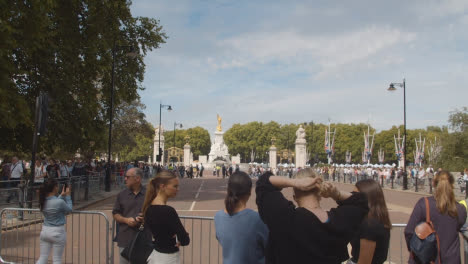 Wide-Shot-of-Crowds-at-a-Ceremonial-Viewing-Area-Outside-Buckingham-Palace