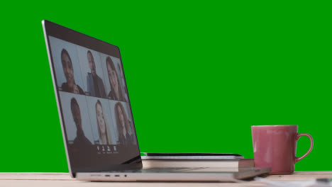 Virtual-Video-Business-Meeting-On-Laptop-Against-Green-Screen
