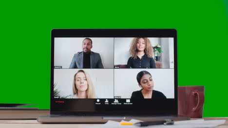 Virtual-Video-Business-Meeting-On-Laptop-Against-Green-Screen-4