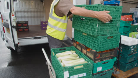 Loading-Bay-Of-UK-Food-Bank-Building-With-Food-Being-Loaded-Into-Vans-1