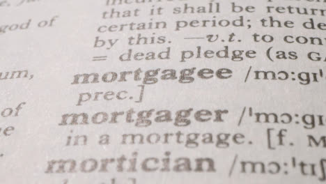 Close-Up-On-Page-Of-Dictionary-With-Definition-Of-Word-Mortgagee
