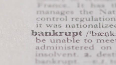 Close-Up-On-Page-Of-Dictionary-With-Definition-Of-Word-Bankrupt