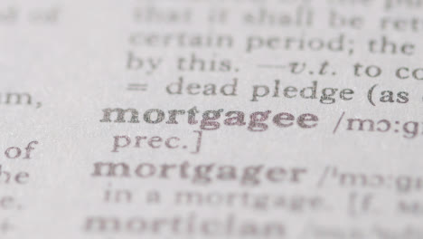Close-Up-On-Page-Of-Dictionary-With-Definition-Of-Word-Mortgagee-1
