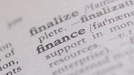 Close-Up-On-Page-Of-Dictionary-With-Definition-Of-Word-Finance