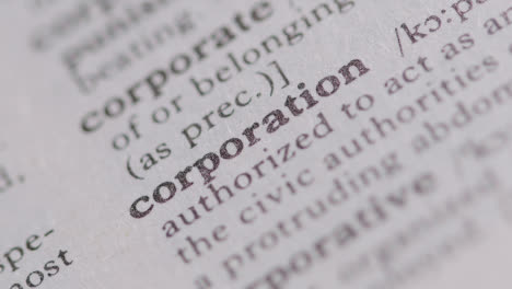 Close-Up-On-Page-Of-Dictionary-With-Definition-Of-Word-Corporation