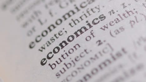 Close-Up-On-Page-Of-Dictionary-With-Definition-Of-Word-Economics