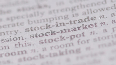 Close-Up-On-Page-Of-Dictionary-With-Definition-Of-Words-Stock-Market