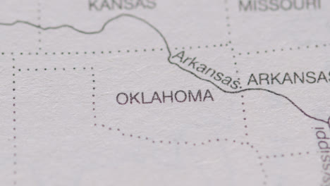 Close-Up-On-Page-Of-Atlas-Or-Encyclopaedia-With-USA-Map-Showing-State-Of-Oklahoma