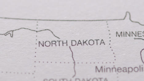 Close-Up-On-Page-Of-Atlas-Or-Encyclopaedia-With-USA-Map-Showing-State-Of-North-Dakota