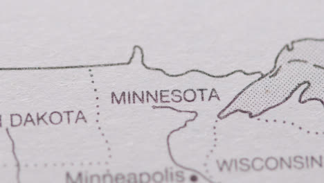 Close-Up-On-Page-Of-Atlas-Or-Encyclopaedia-With-USA-Map-Showing-State-Of-Minnesota