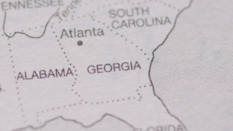 Close-Up-On-Page-Of-Atlas-Or-Encyclopaedia-With-USA-Map-Showing-States-Of-Georgia-And-Alabama