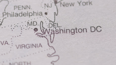 Close-Up-On-Page-Of-Atlas-Or-Encyclopaedia-With-USA-Map-Showing-State-Of-Washington-DC