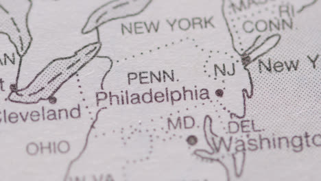 Close-Up-On-Page-Of-Atlas-Or-Encyclopaedia-With-USA-Map-Showing-State-Of-Pennsylvania