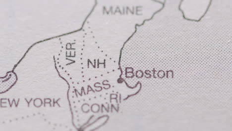 Close-Up-On-Page-Of-Atlas-Or-Encyclopaedia-With-USA-Map-Showing-States-Of-Vermont,-New-Hampshire-And-Massachusetts