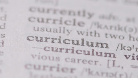 Close-Up-On-Page-Of-Dictionary-With-Definition-Of-Word-Curriculum