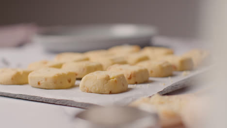 Tray-Of-Homemade-Shortbread-Cookies-On-Kitchen-Work-Surface-With-Ingredients