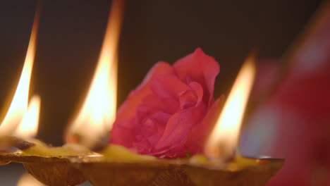 Close-Up-Of-Burning-Lamps-Celebrating-Festival-Of-Diwali-1