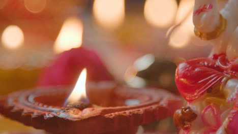 Close-Up-Of-Burning-Lamps-Celebrating-Festival-Of-Diwali-3