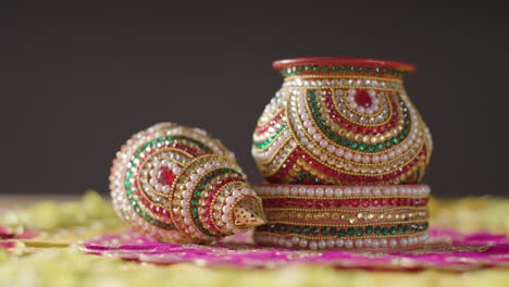 Traditional-Coconut-Pots-On-Table-Decorated-For-Celebrating-Festival-Of-Diwali-3