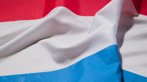 Nahaufnahme-Studioaufnahme-Des-Füllenden-Rahmens-Der-Holländischen-Flagge