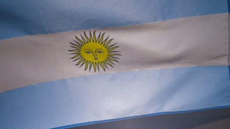 Close-Up-Studio-Shot-Of-Argentinian-Flag-Flying-Filling-Frame