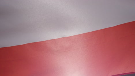 Close-Up-Studio-Shot-Of-Polish-Flag-Flying-Filling-Frame