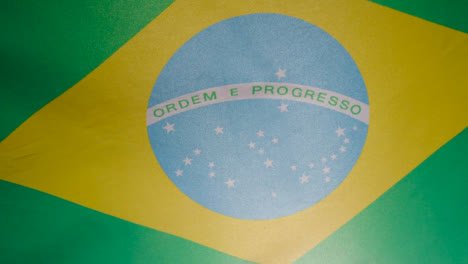 Close-Up-Studio-Shot-Of-Brazilian-Flag-Flying-Filling-Frame
