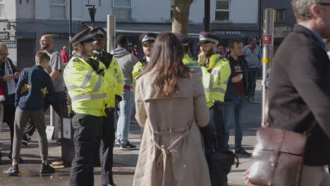 Police-Officers-Outside-The-Emirates-Stadium-Home-Ground-Arsenal-Football-Club-London-With-Supporters-On-Match-Day
