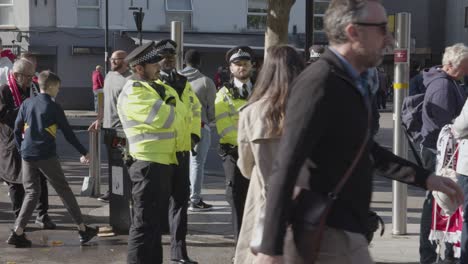 Police-Officers-Outside-The-Emirates-Stadium-Home-Ground-Arsenal-Football-Club-London-With-Supporters-On-Match-Day