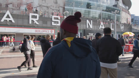 Exterior-Of-The-Emirates-Stadium-Home-Ground-Arsenal-Football-Club-London-With-Supporters-On-Match-Day-12