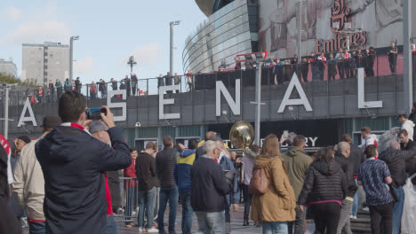 Exterior-Of-The-Emirates-Stadium-Home-Ground-Arsenal-Football-Club-London-With-Supporters-On-Match-Day-18