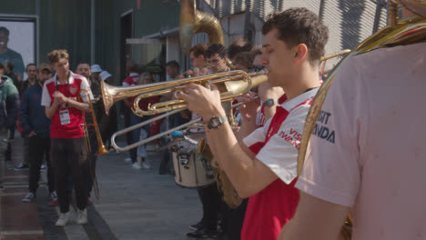 Band-Playing-Outside-The-Emirates-Stadium-Home-Ground-Arsenal-Football-Club-London-With-Supporters-On-Match-Day