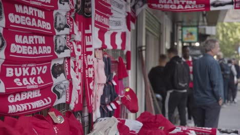 Stall-Selling-Club-Merchandise-Outside-The-Emirates-Stadium-Home-Ground-Arsenal-Football-Club-London-With-Supporters-On-Match-Day-1